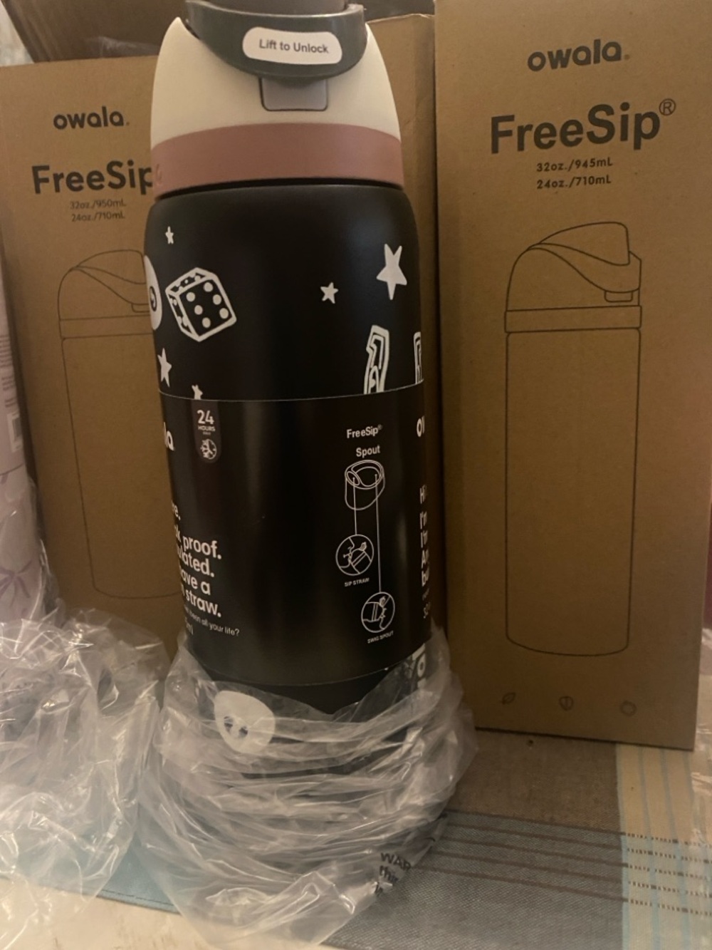 owala FreeSip Black Stainless Steel Water Bottle with Pink Accent